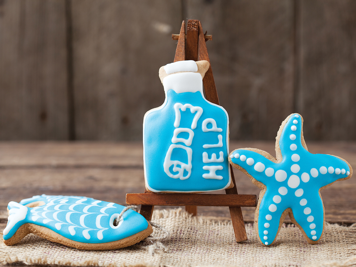 Sugar cookies in shapes of fish and starfish