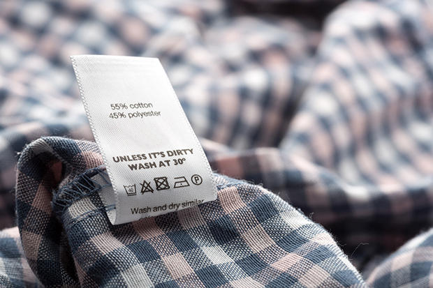 Here's What The Laundry Symbols On Clothing Tags Mean