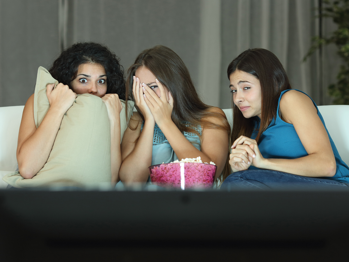 Girls watching a scary movie