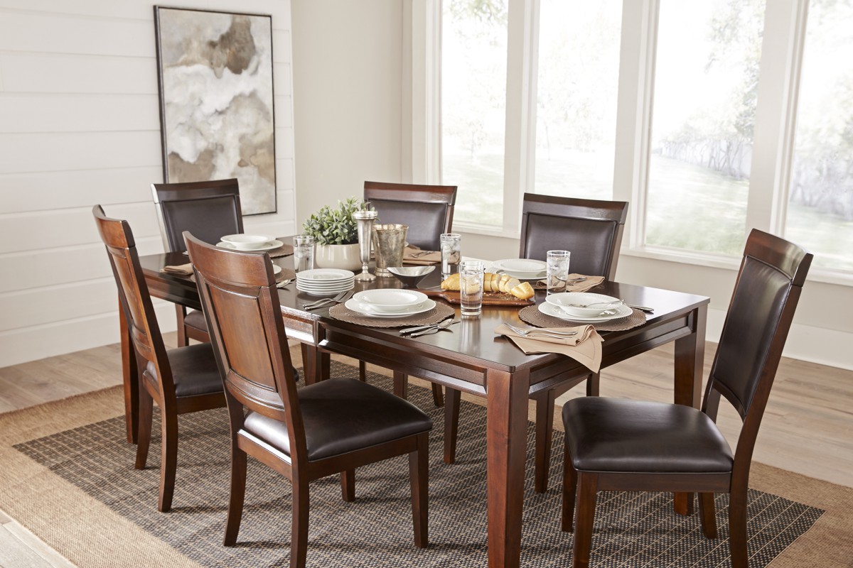 Dining table and chairs with rug