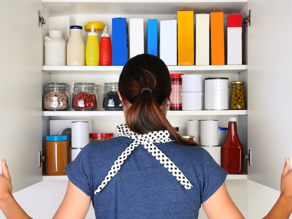 Woman in front of pantry