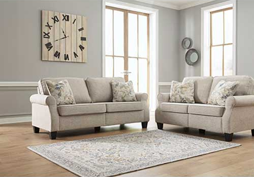 Living room with an Alessio Beige Sofa and Loveseat