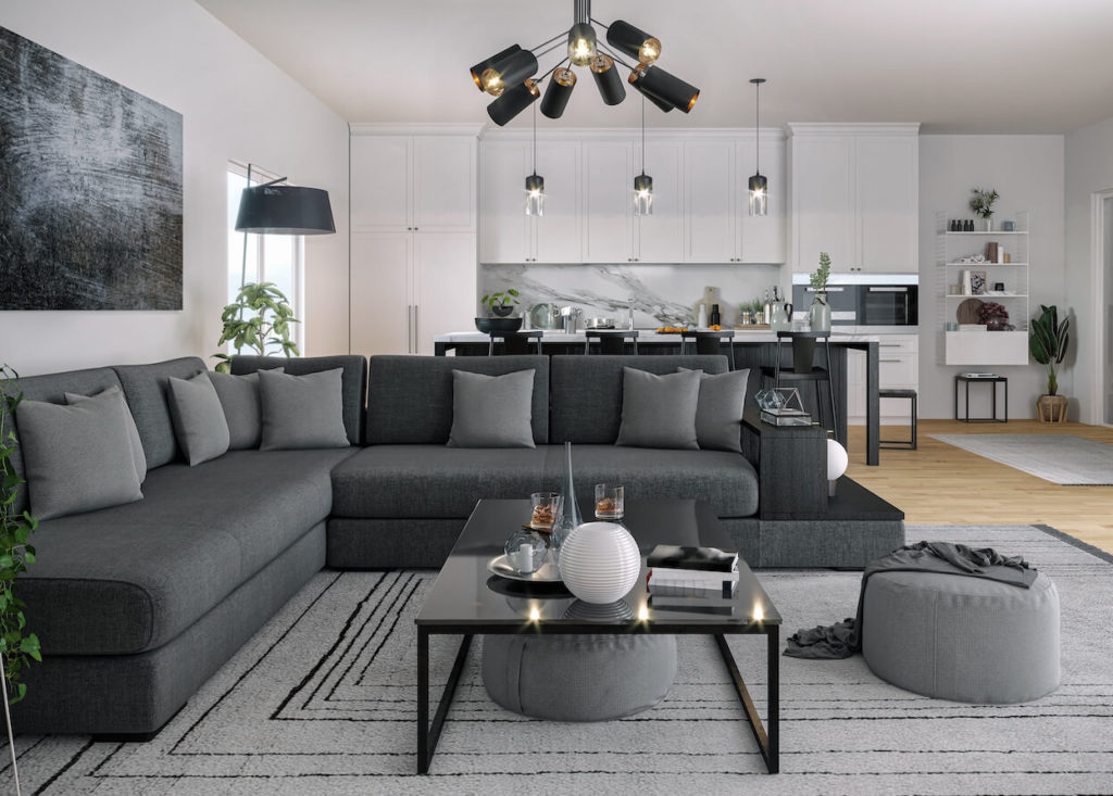 Modern gray living room with a gray sectional and throw pillows