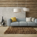 <b>Natural Materials</b><br>
A modern living room is inspired by nature. Layer earthy materials such as wood, rock, slate, teak, cotton, and wool to create texture. Plants are also an important element in modern design. Wooden room with light gray couch