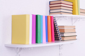 organized books on two floating shelves