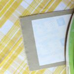 Following the instructions provided with the paper, transfer your menu onto your napkins. (We cut fabric to make homemade napkins instead of buying premade napkins.)