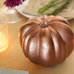 <b>Project Two: Painted Produce</b><br>
Seasonal produce such as squash, gourds, or pumpkins, can add a lot of beauty to a fall table. If you’re looking for a little glam, spray paint produce in a shiny metallic.