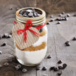 <strong>7. Mix in Jar.</strong> Create a cookie dough, cake, or hot chocolate mix in a glass jar. Layer ingredients for a pleasing look. Top the jar with a lid and tie it with a pretty ribbon that has the recipe attached.