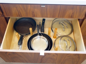 A kitchen drawer for pots and pans: after.