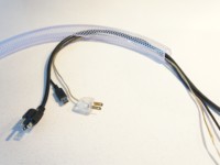 Hide cords in plastic tubing.