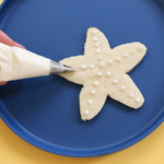 Icing detail completes your starfish-shaped sugar cookies.