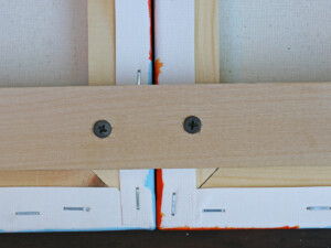 Add six screws per support panel.