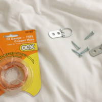 You can also use picture-hanging hooks with the wire.