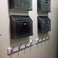 Use a wall in the laundry room for a command station. Photo: Organized Chaos With a Twist