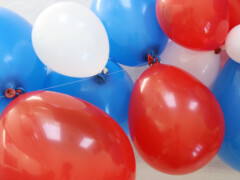 Continue working with two balloons at a time until all balloons have been added to the strand.