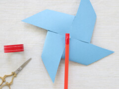 Use a small piece of tape to cover the bent end of the pin.