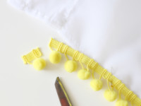 The trim should start just below the opening.