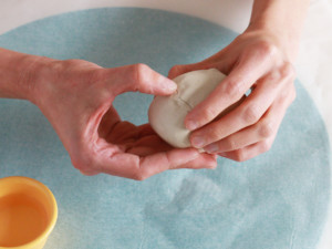 Blend the edges into the body of the pot by gently smoothing the crease with your fingers until they have combined.