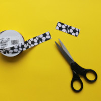 Cutting soccer ball ribbon