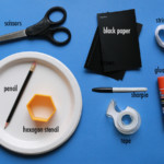 Craft supplies for soccer ball garland