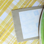 Following the instructions provided with the paper, transfer your menu onto your napkins. (We cut fabric to make homemade napkins instead of buying premade napkins.)
